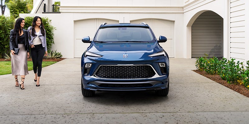 Encore GX Vehicle Parked In Front Of A Home