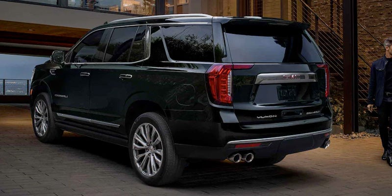 Side view of the 2022 GMC Yukon parked