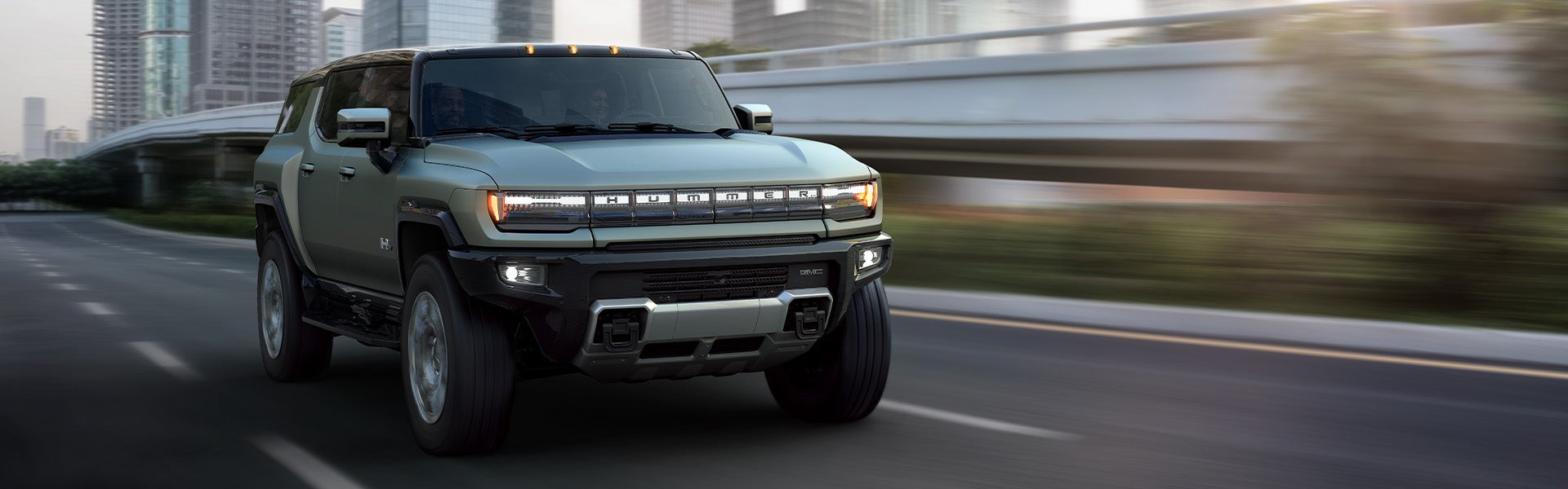 Hummer EV Vehicle Moving On A Road