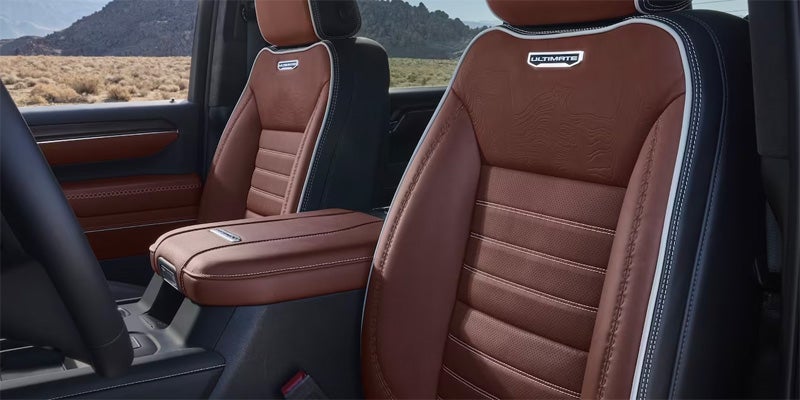 2024 GMC Sierra HD interior showcasing perforated leather seating