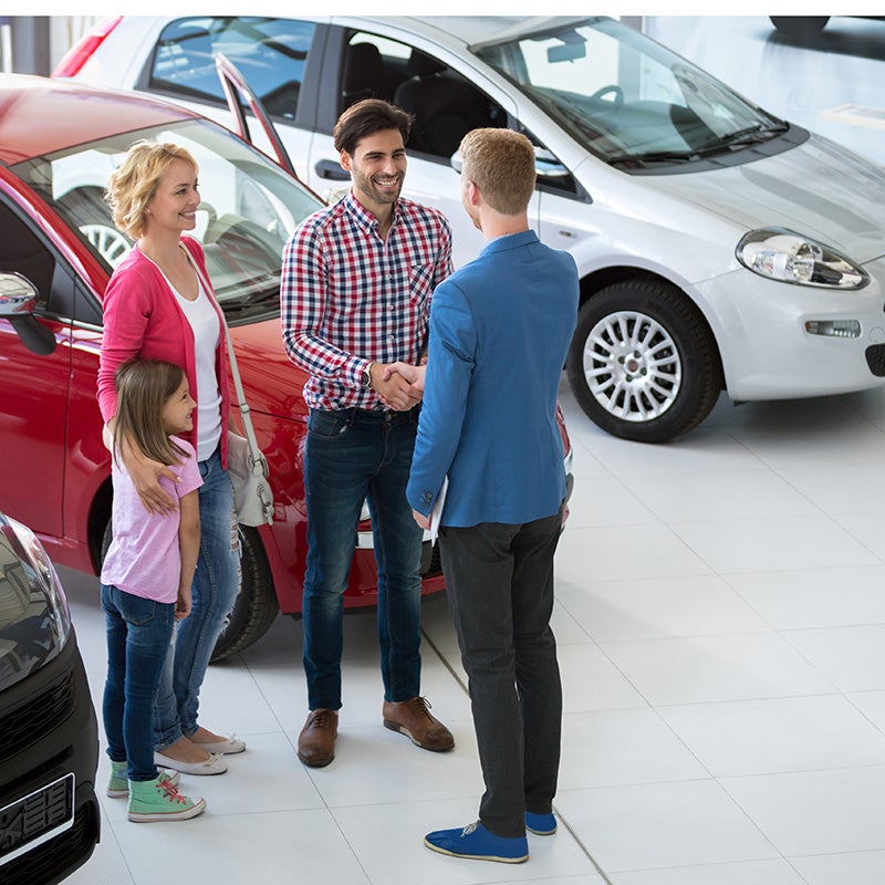 Dublin Buick GMC in Dublin CA family looking at new cars in the showroom