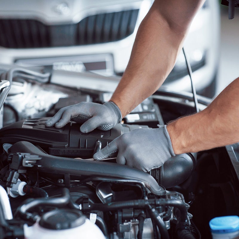 Dublin Buick GMC in Dublin CA technician checking engine