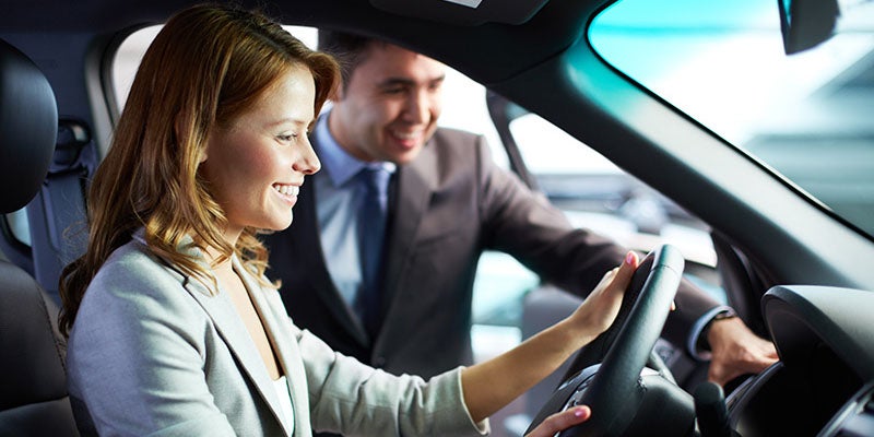 Dublin Buick GMC in Dublin CA customer sitting in new car 