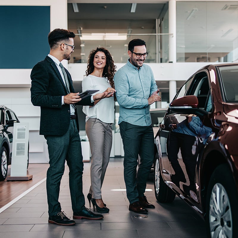 Dublin Buick GMC in Dublin CA couple looking at new cars